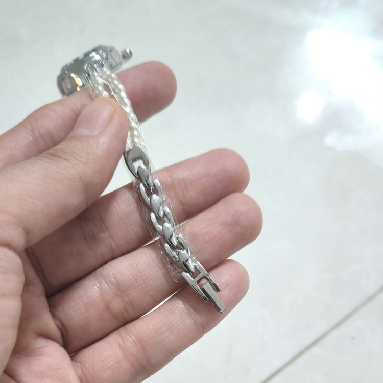 ساعت مچی عقربه ای زنانه مدل کژوال بند مرواریدی کد 4