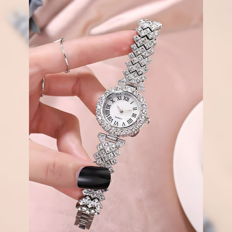 ساعت مچی عقربه ای زنانه مدل نگیندار به همراه جعبه