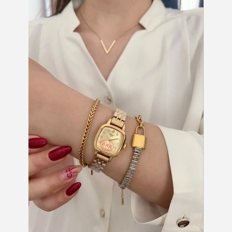 ساعت مچی زنانه تیسوت TISSOT بند استیل طلایی صفحه طلایی ضدآب شیک وجذاب