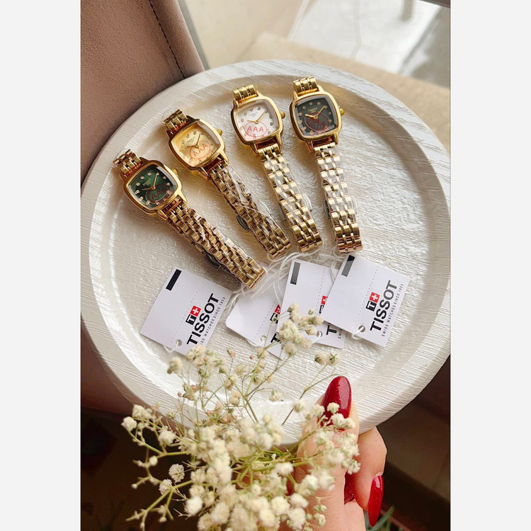 ساعت مچی زنانه تیسوت TISSOT بند استیل طلایی صفحه طلایی ضدآب شیک وجذاب