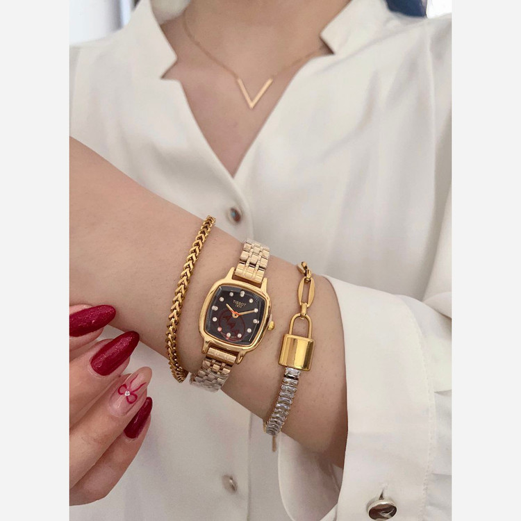 ساعت مچی زنانه تیسوت TISSOT بند استیل طلایی صفحه طلایی ضدآب شیک وجذاب