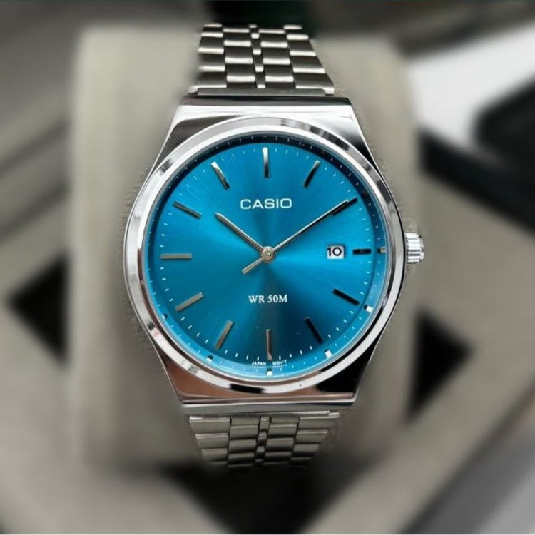 ساعت مچی مردانه کاسیوCASIO وینتیج بند نقره ای صفحه نمایش گرد رنگ بندی کد 9023